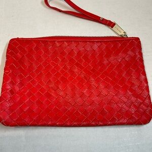 Cole Haan Leather Wristlet/cosmetic bag. Red woven leather zip